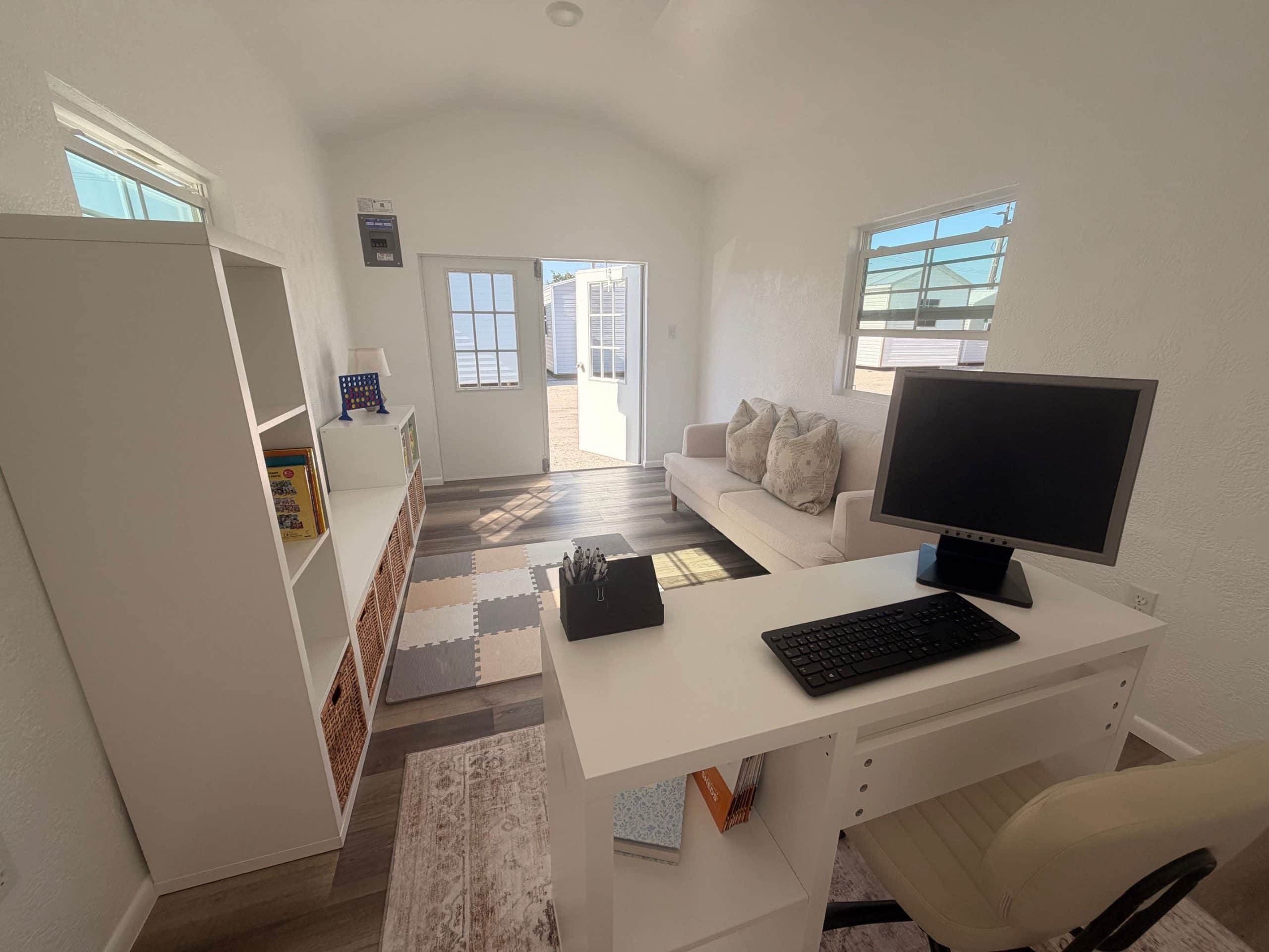 Finished bonus room with open door and natural light